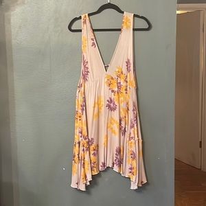 Loose fitting tan dress with purple and yellow flowers, size large